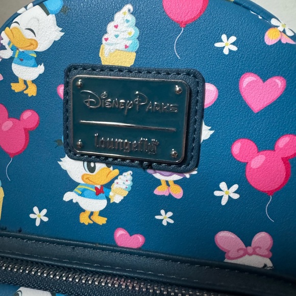 Loungefly Disney Parks Exclusive Donald & Daisy Mini Backpack - Picture 2 of 7